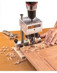 Système universel pour le perçage de charnières